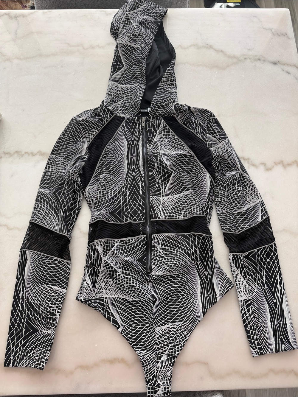 iHeartRaves Black & White Geometric Mesh-Panel Hooded Bodysuit